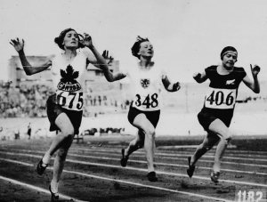 Myrtle_Cook_of_Canada_(left)_winning_a_preliminary_heat_in_the_womens_100_metres_race_at_the_VIIIth_Summer_Olympic_Games